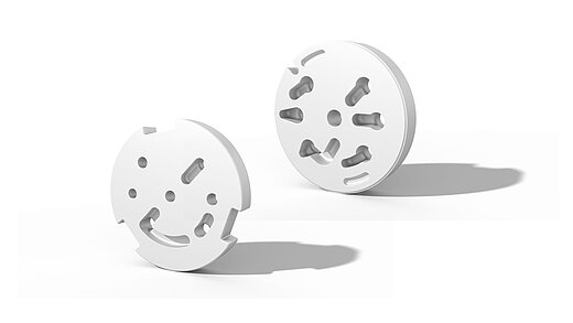 Two white grinding discs