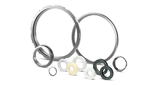 Sealing components for industrial pumps on white background