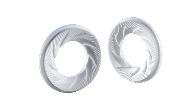 Two white ceramic coffee discs