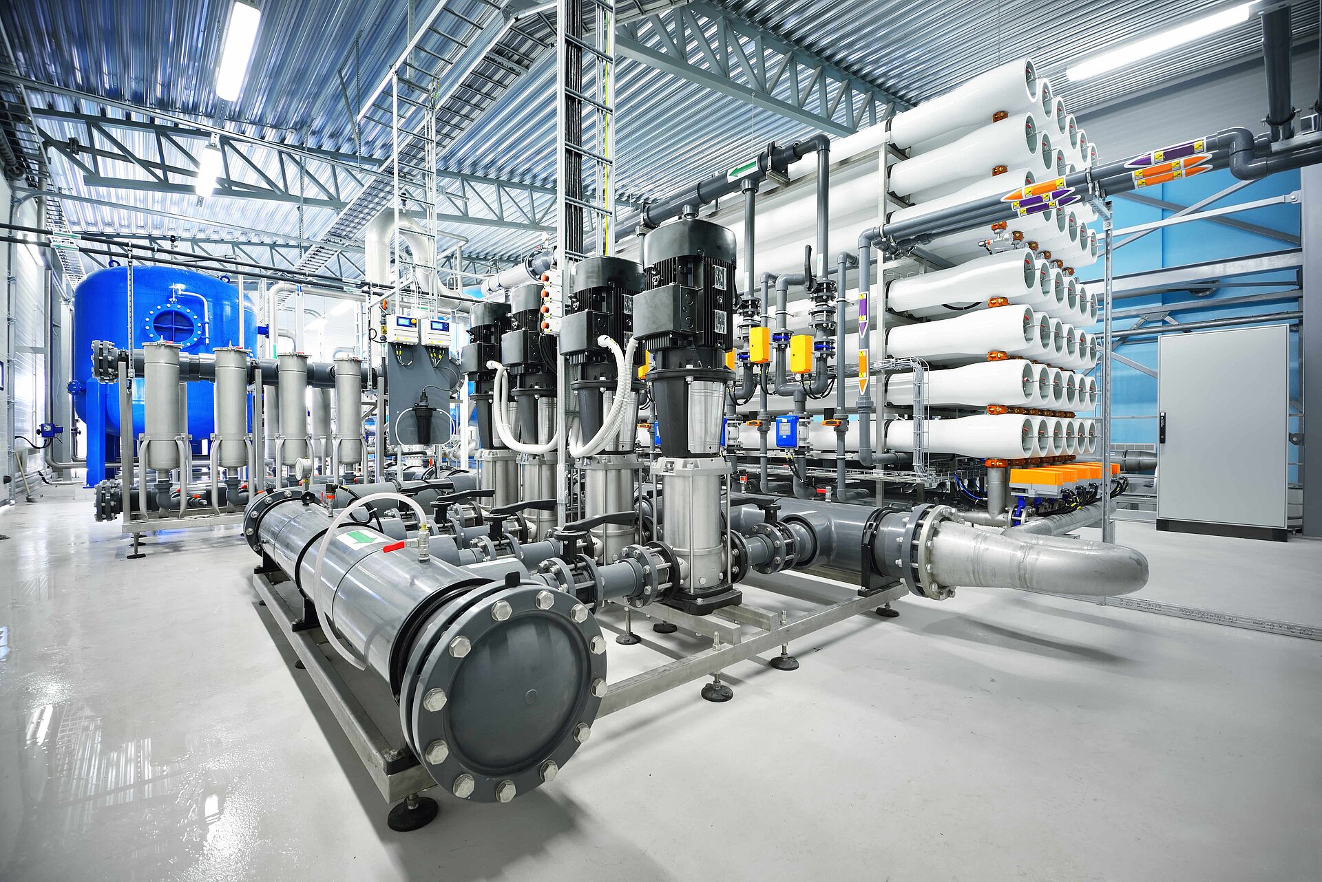 View into a factory hall with numerous pumps